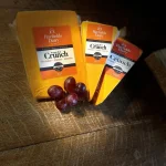 Hayfields Crunch cheese in 1kg, 500g and 200g packs with red grapes
